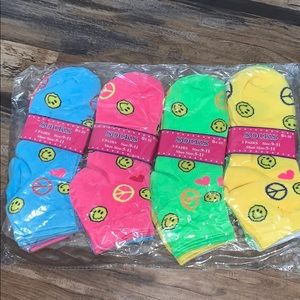 I’m selling smiley face socks .